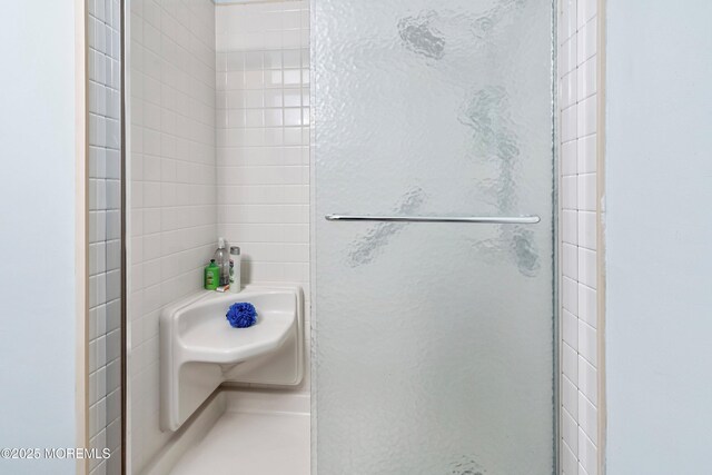 bathroom with walk in shower