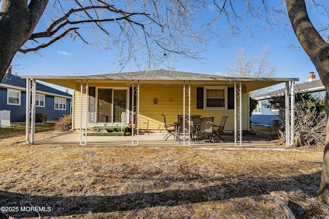 rear view of house featuring a patio area