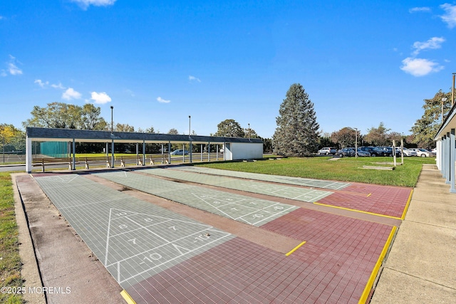 view of community featuring a yard