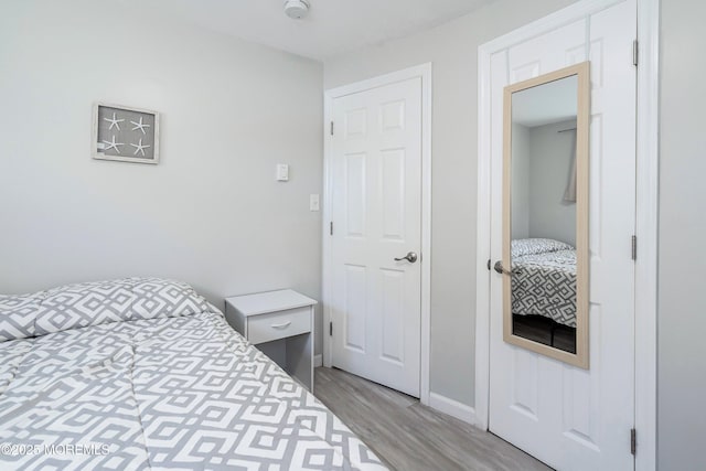 bedroom featuring light wood-type flooring