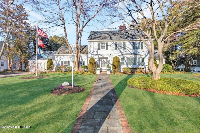 view of front of home with a front yard