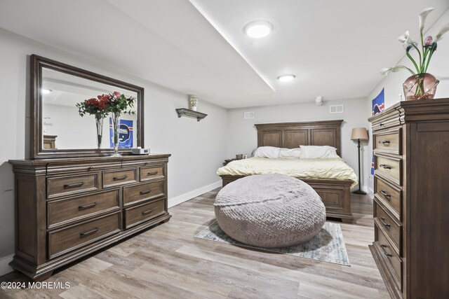 bedroom featuring light wood-type flooring