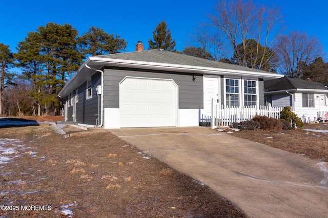 ranch-style home with a garage