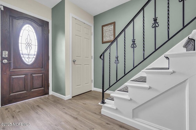 foyer entrance featuring light hardwood / wood-style flooring