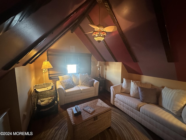 interior space with vaulted ceiling with beams and ceiling fan