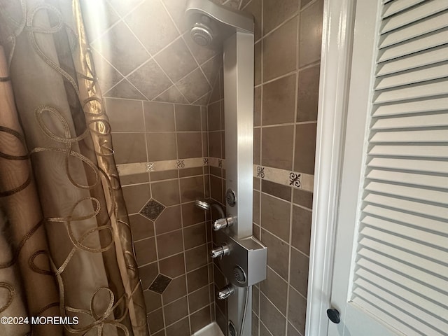 bathroom with a shower with curtain