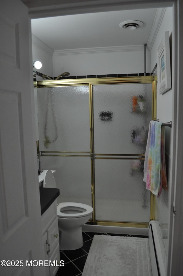 bathroom featuring walk in shower, baseboard heating, tile patterned flooring, crown molding, and vanity