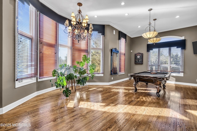 recreation room with a chandelier, hardwood / wood-style floors, ornamental molding, and pool table