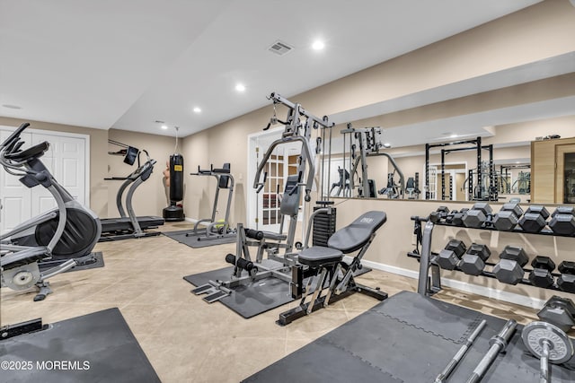 gym featuring light tile patterned floors