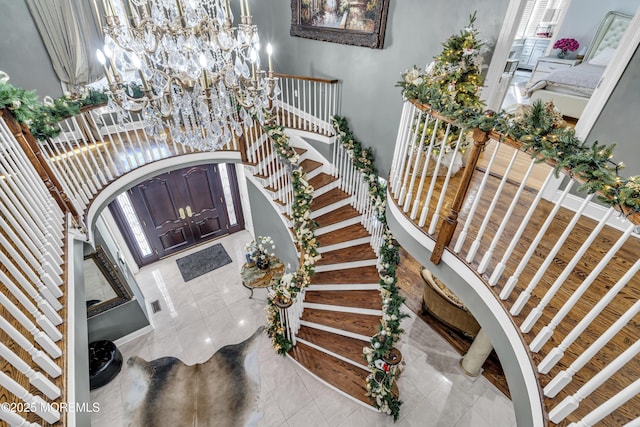 stairs with tile patterned floors