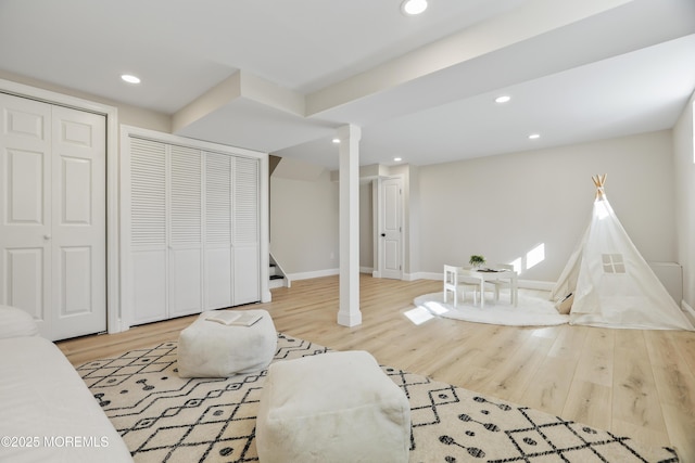 game room featuring hardwood / wood-style floors