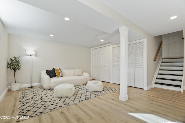 living room with light hardwood / wood-style floors