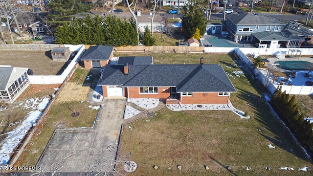 birds eye view of property with a residential view