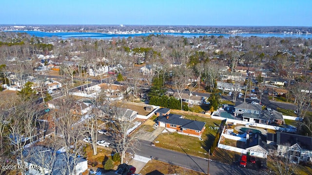 aerial view featuring a water view and a residential view