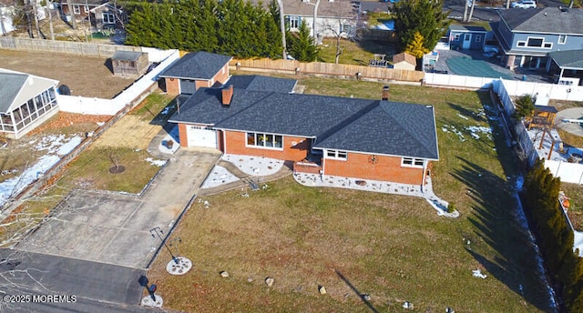 drone / aerial view featuring a residential view