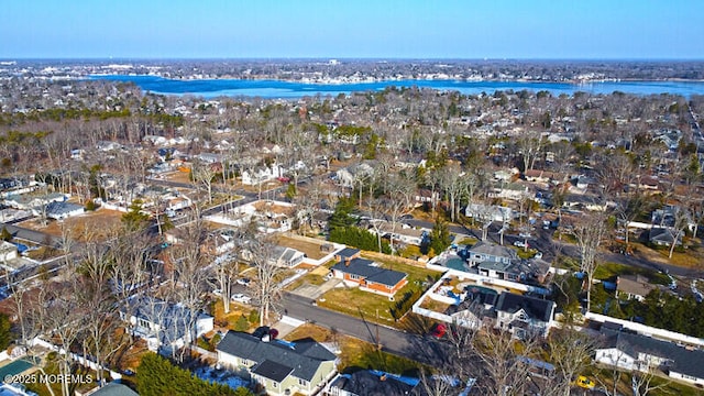aerial view featuring a water view and a residential view