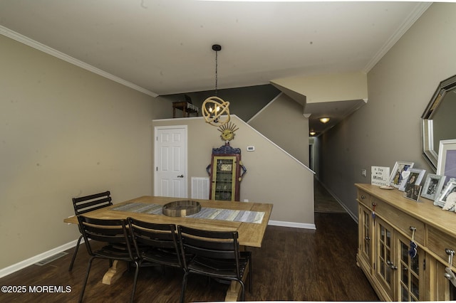 dining area with a chandelier, crown molding, and dark hardwood / wood-style flooring