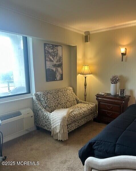 carpeted living room with crown molding and a wall mounted air conditioner