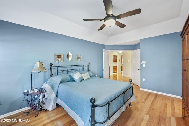 bedroom featuring ceiling fan and light hardwood / wood-style floors