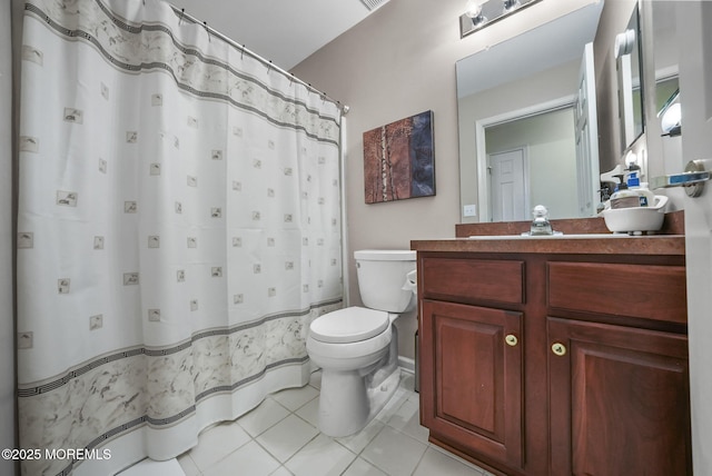 bathroom with tile patterned flooring, toilet, vanity, gas water heater, and curtained shower