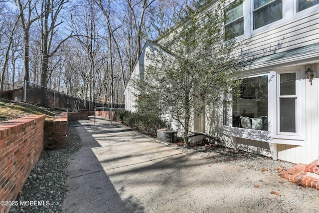 exterior space featuring a patio area and fence