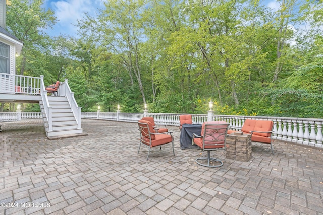 view of patio / terrace featuring an outdoor fire pit