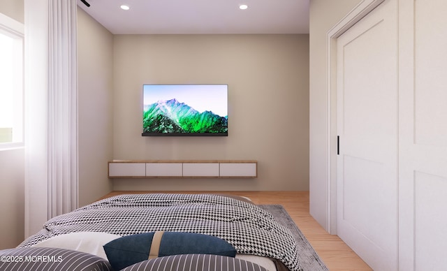 bedroom featuring light wood-type flooring