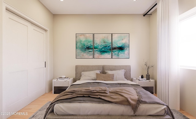 bedroom featuring light hardwood / wood-style flooring