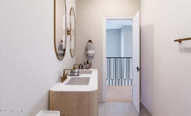 bathroom with tile patterned floors and vanity