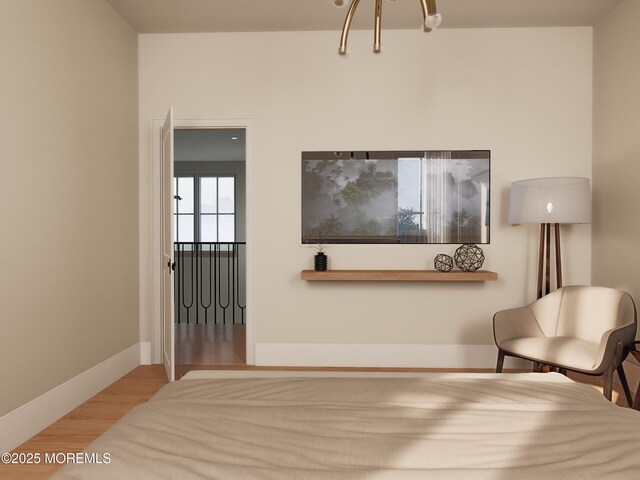 sitting room with light hardwood / wood-style floors