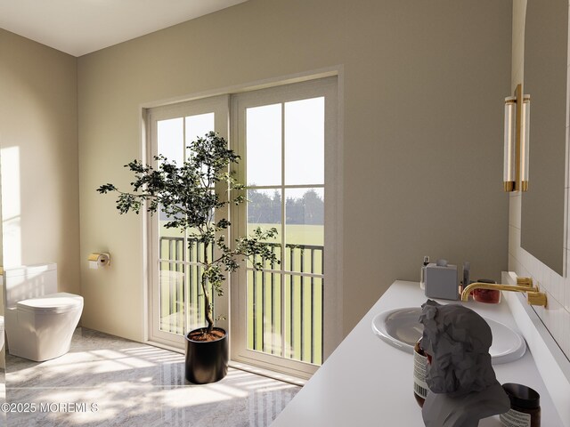 bathroom with vanity and toilet