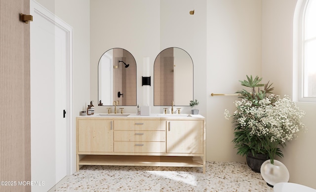 bathroom with vanity and a towering ceiling