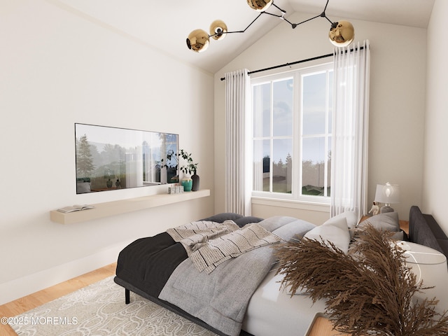 bedroom featuring vaulted ceiling and hardwood / wood-style flooring