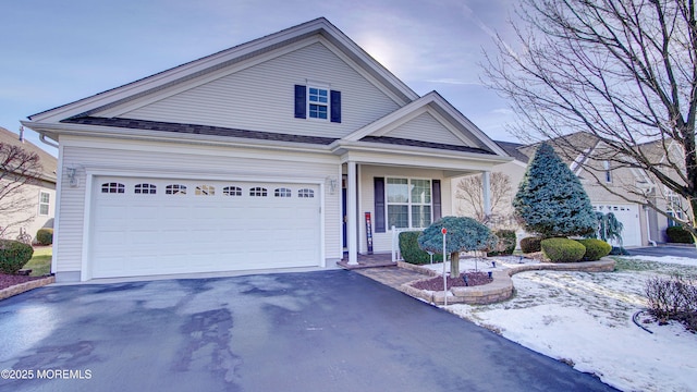 view of front of property with a garage