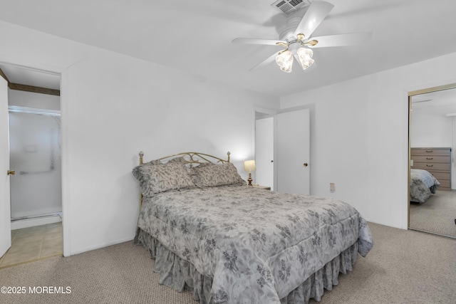 carpeted bedroom with a closet, ceiling fan, and a baseboard radiator