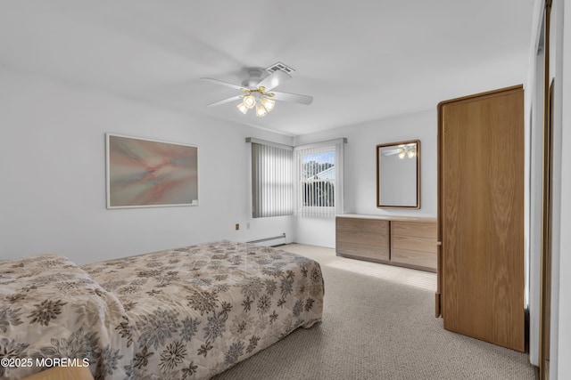 bedroom with ceiling fan, light colored carpet, and baseboard heating