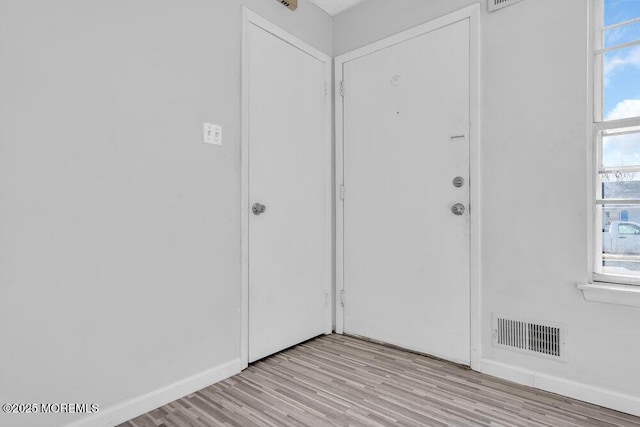 entryway with light wood-type flooring