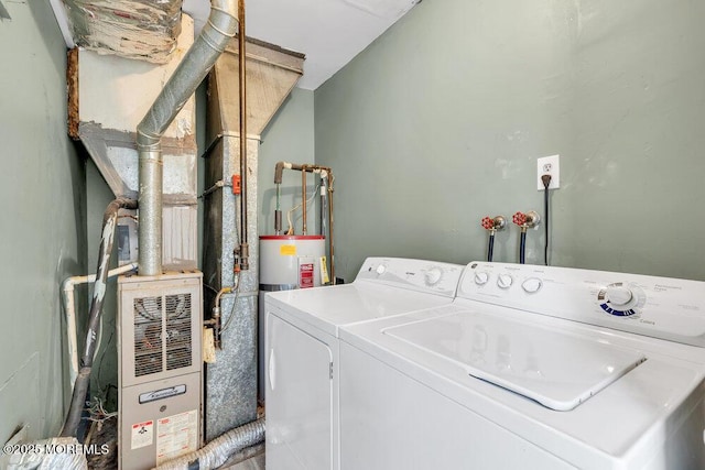 laundry room featuring washer and clothes dryer