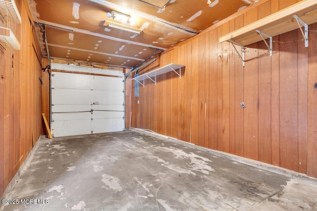 garage with wood walls