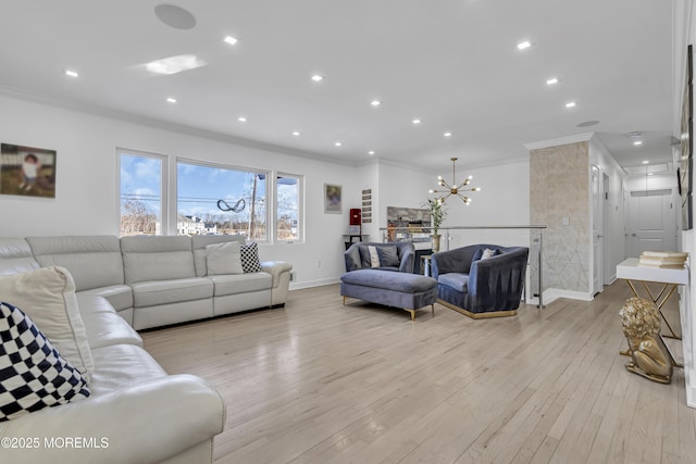 living room featuring light wood-type flooring, crown molding, and a chandelier