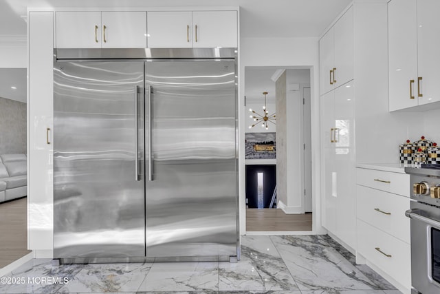 kitchen featuring white cabinets and stainless steel appliances