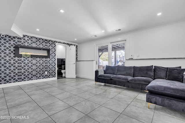 living room featuring light tile patterned floors and ornamental molding