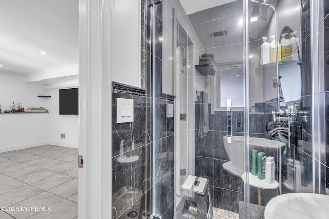 bathroom featuring tile patterned floors, an enclosed shower, and ornamental molding