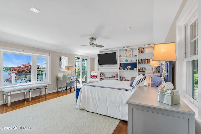 bedroom featuring hardwood / wood-style flooring and ceiling fan