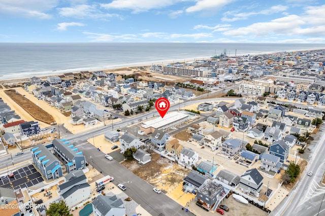 aerial view with a view of the beach and a water view