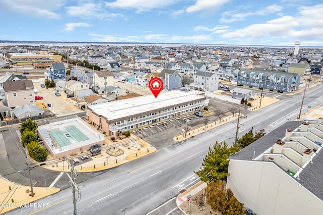 birds eye view of property with a residential view