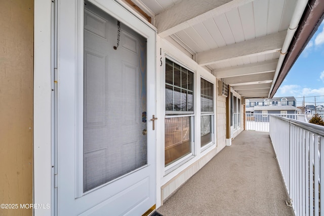 balcony with an AC wall unit