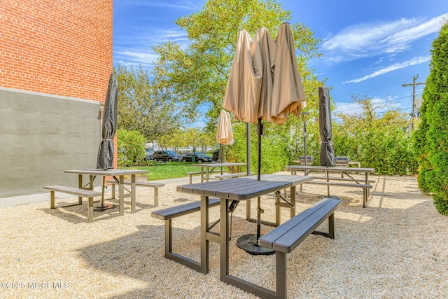 view of home's community featuring a patio area