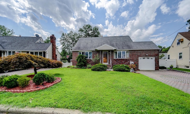 single story home with a garage and a front yard