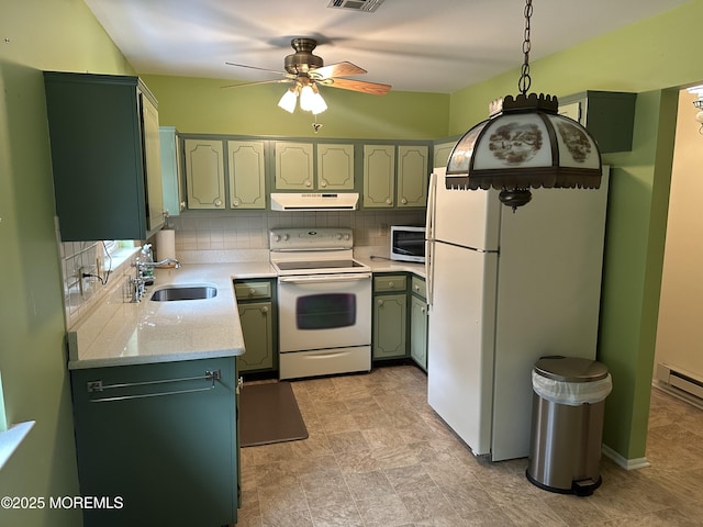 kitchen featuring sink, white appliances, ceiling fan, decorative backsplash, and pendant lighting